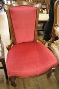 A red upholstered nursing chair