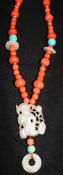 A carved jade, coral and hardstone bead necklace with silver gilt clasp, 32in.