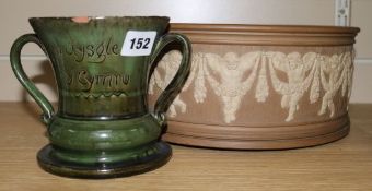 A Doulton Silicon ware planter and a Ewenny pottery loving cup