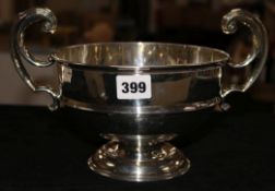 An early 20th century silver two handled pedestal bowl, Jones & Crompton, Birmingham, 1910?, width