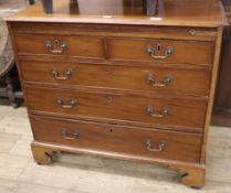 A Georgian mahogany chest, with brushing slide, W.96cm