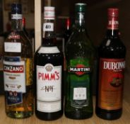 Four various bottles (Pimms, Cinzano, Dubonet and Martini)