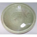 A Chinese Longquan Celadon dish, Ming dynasty, restored