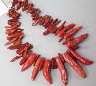 A coral necklace with silver clasp, 20in.