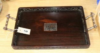 A Chinese prunus-carved and pierced rosewood rectangular tray with faux bamboo white metal