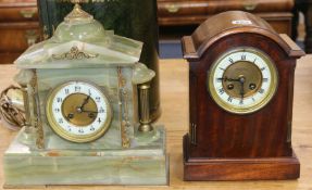 An onyx and gilt metal mantel clock and a mahogany mantel clock