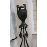 A Grecian style bronze vase on stand