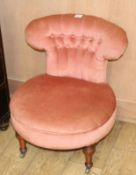 A Victorian pink button back nursing chair