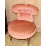 A Victorian pink button back nursing chair