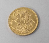 A George V 1911 gold full sovereign.