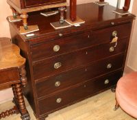 An Edwardian mahogany chest of drawers, with brushing slide, W.102cm