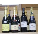 A quantity of champagne and a bottle of vintage port