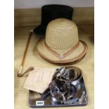 A black silk top hat, 6 Brownie straw hats, circa 1920, two Guide belts and a riding crop