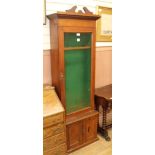 A Continental oak gun cabinet, H.194cm