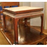 A Chinese hardwood leather topped coffee table, W.62cm