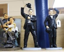 A pair of Leonardo resin figures of Laurel and Hardy and a Laurel and Hardy 'barber shop' group