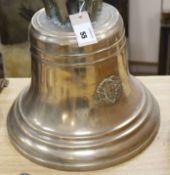 A large cast bronze ship's bell, with crown top and applied badge with initials J.B. and a harp over