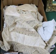 A quantity of christening gowns