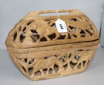 A Botswana wooden box, with carved animal design