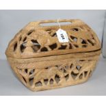 A Botswana wooden box, with carved animal design