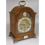 A Georgian style mahogany bracket clock retailed by Searle & Co Ltd