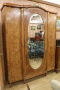 A French walnut mirrored armoire, H.227cm