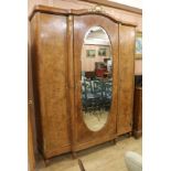 A French walnut mirrored armoire, H.227cm