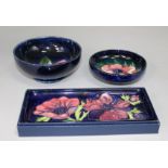 A Moorcroft anemone small dish and tray together with a decorated spring flowers bowl (3)