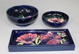 A Moorcroft anemone small dish and tray together with a decorated spring flowers bowl (3)