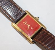A lady's silver gilt Must de Cartier manual wind wrist watch.