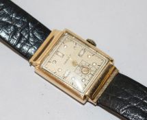 A gentleman's 14kt gold Chalet wrist watch.