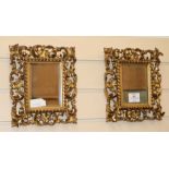 A pair of 19th century Florentine carved giltwood rectangular wall mirrors, H.25cm