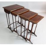 A late Victorian nest of rosewood quartetto tables, with brass strung tops, W.1ft 8in. D.1ft 2in.