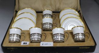 A boxed Shelley coffee set of silver cup holders
