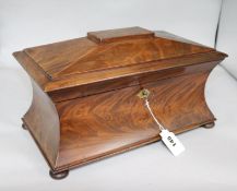 A Victorian mahogany tea caddy