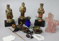 A Japanese carved wood articulated Samurai toy and various small Oriental items, including two