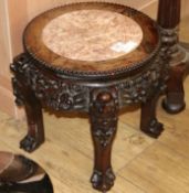 An early 20th century Chinese harwood low table, with marble inset top, H.38cm
