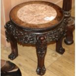 An early 20th century Chinese harwood low table, with marble inset top, H.38cm