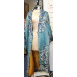 A 19thC Chinese robe made in the early 1920's into an evening coat