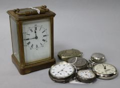 A collection of pocket watches and a carriage clock