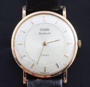 A gentleman's 18ct gold Duward Diplomatic manual wind dress wrist watch, with baton numerals, on