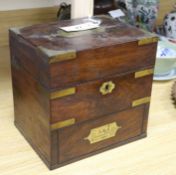 A Georgian mahogany brass-bound apothecary chest, with fitted interior and base drawer with