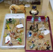 A Beswick Palomino foal and a collection of miniature coloured glass animals, including two monkey