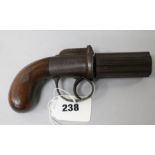 A 6 shot percussion pepperbox revolver, foliate engraved frame, fluted barrels, Birmingham proof