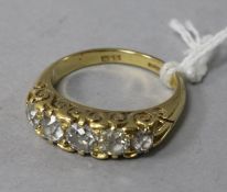 A Victorian style 18ct gold and graduated five stone diamond ring, size N.