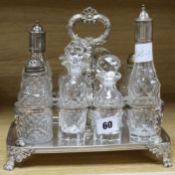 An Old Sheffield cruet stand with eight facetted glass bottles.