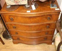 A walnut serpentine chest of drawers, W.78cm