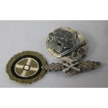 Two German badges and a cloth badge