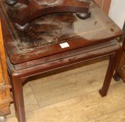 A Chinese hardwood leather topped coffee table, W.62cm