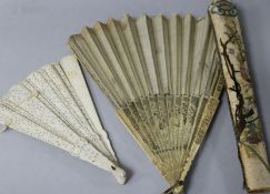 Two Chinese ivory fans and an embroidered fan case